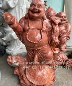 Tượng Phật di lặc đá đỏ đứng mai rùa